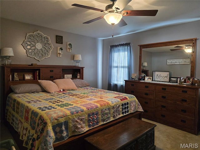 310 E 1st St, Ramsey, IL 62080 - bedroom with light colored carpet and a ceiling fan