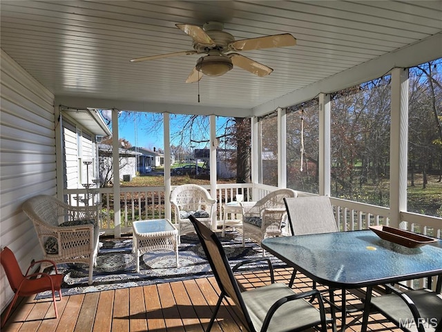 310 E 1st St, Ramsey, IL 62080 - sunroom / solarium with a ceiling fan and healthy amount of natural light