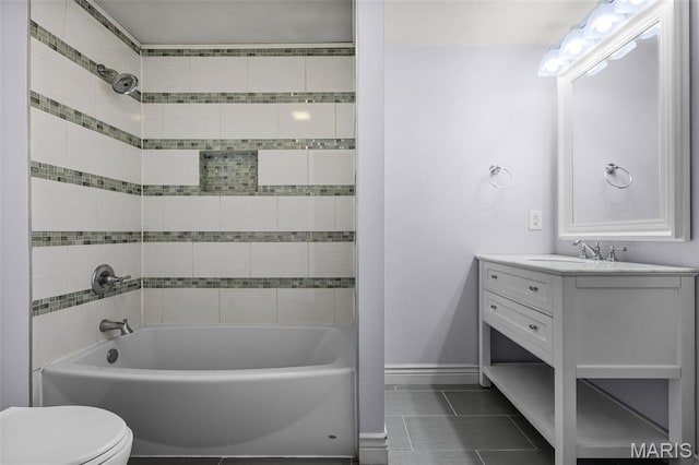 7104 Leona St, Saint Louis, MO 63116 - bathroom with tile patterned floors, vanity, and shower / washtub combination