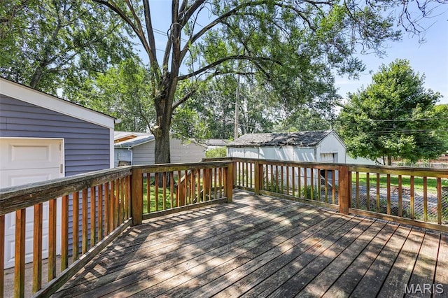 7104 Leona St, Saint Louis, MO 63116 - wooden terrace featuring an outdoor structure