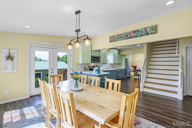4846 S Point Rd, Washington, MO 63090 - dining space featuring dark wood finished floors, stairway, french doors, and recessed lighting