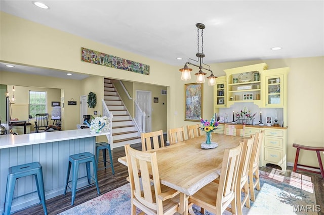 4846 S Point Rd, Washington, MO 63090 - dining space with stairs, recessed lighting, and wood finished floors