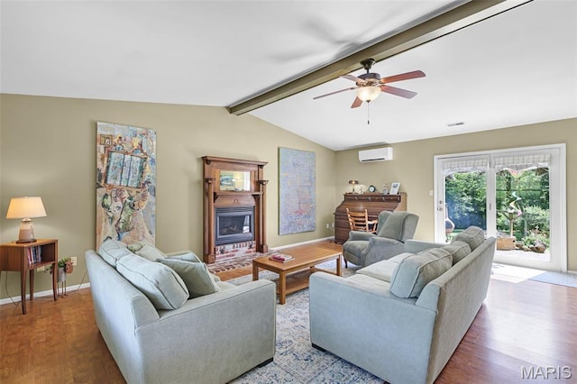 4846 S Point Rd, Washington, MO 63090 - living room featuring a wall mounted air conditioner, wood finished floors, ceiling fan, and a glass covered fireplace