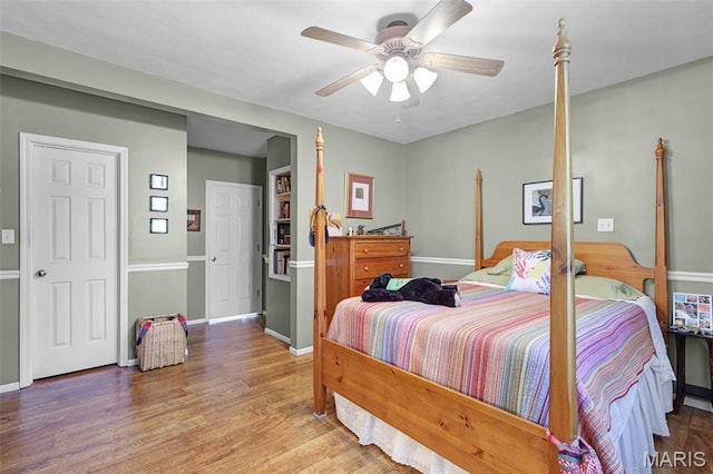 4846 S Point Rd, Washington, MO 63090 - bedroom featuring wood finished floors and a ceiling fan