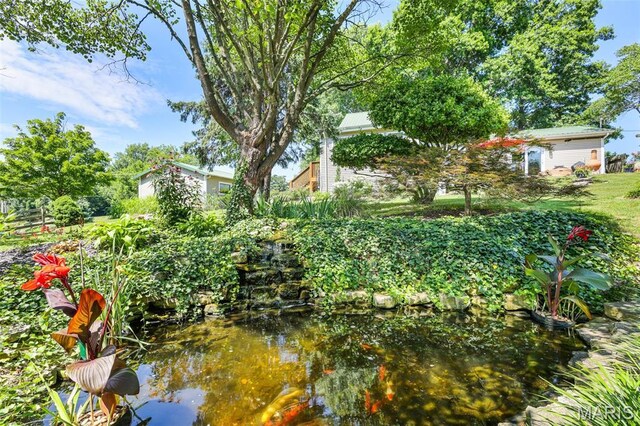 4846 S Point Rd, Washington, MO 63090 - view of yard featuring a small pond
