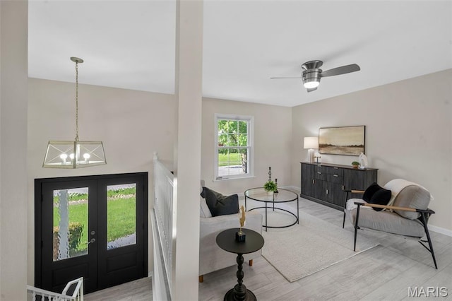 383 Messina Dr, Ballwin, MO 63021 - entrance foyer featuring a chandelier, wood finished floors, and french doors