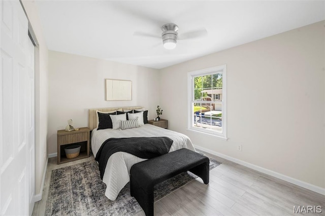 383 Messina Dr, Ballwin, MO 63021 - bedroom featuring wood finished floors, a ceiling fan, and a closet
