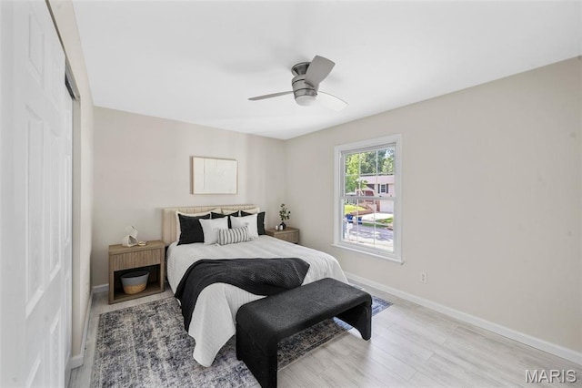 383 Messina Dr, Ballwin, MO 63021 - bedroom featuring a closet, light wood-style floors, and ceiling fan