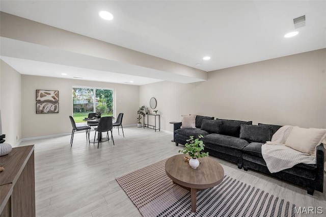 383 Messina Dr, Ballwin, MO 63021 - living room featuring light wood-style floors and recessed lighting