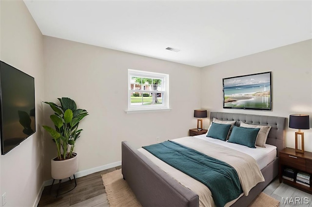 383 Messina Dr, Ballwin, MO 63021 - bedroom with light wood-style flooring and baseboards