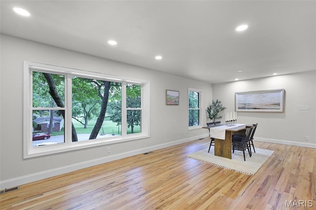 246 Leichester Cir, Ballwin, MO 63011 - dining room with healthy amount of natural light, light wood-type flooring, and recessed lighting