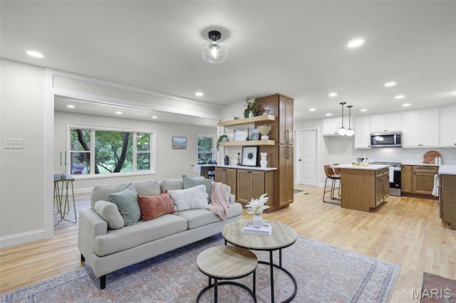 246 Leichester Cir, Ballwin, MO 63011 - living room with light wood-style flooring and recessed lighting