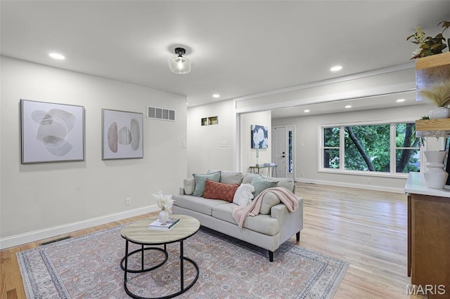 246 Leichester Cir, Ballwin, MO 63011 - living area featuring light wood-style flooring and recessed lighting