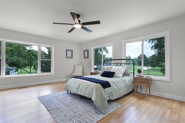 246 Leichester Cir, Ballwin, MO 63011 - bedroom with light wood-style flooring and ceiling fan