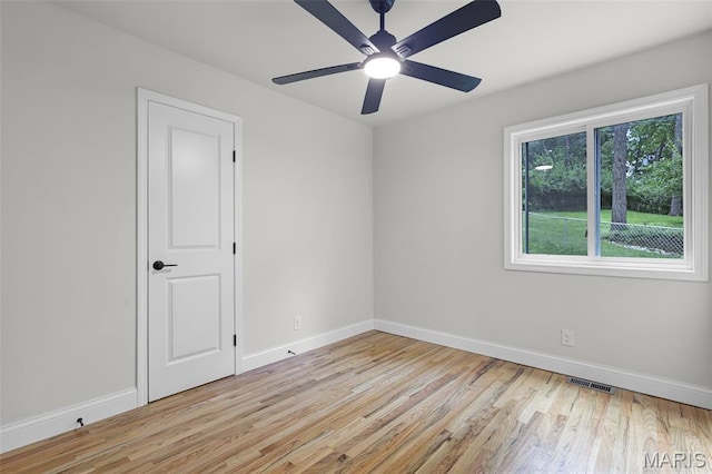 246 Leichester Cir, Ballwin, MO 63011 - spare room featuring light wood-style floors and a ceiling fan