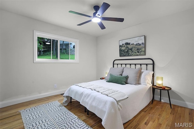 246 Leichester Cir, Ballwin, MO 63011 - bedroom featuring wood finished floors and a ceiling fan
