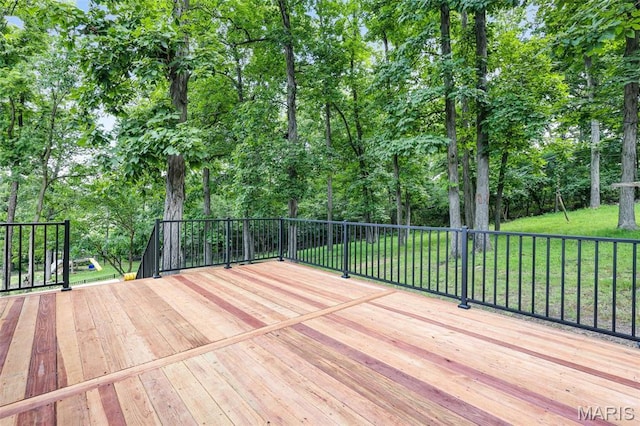 246 Leichester Cir, Ballwin, MO 63011 - deck with a lawn and view of scattered trees