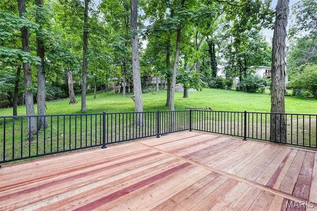246 Leichester Cir, Ballwin, MO 63011 - wooden deck featuring a lawn and view of wooded area