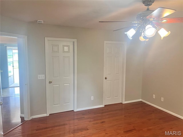 1 Calumet Meadows Ct, Ofallon, MO 63376 - unfurnished bedroom featuring wood finished floors and a ceiling fan