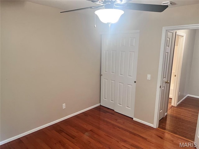 1 Calumet Meadows Ct, Ofallon, MO 63376 - unfurnished bedroom with wood finished floors, a closet, and a ceiling fan