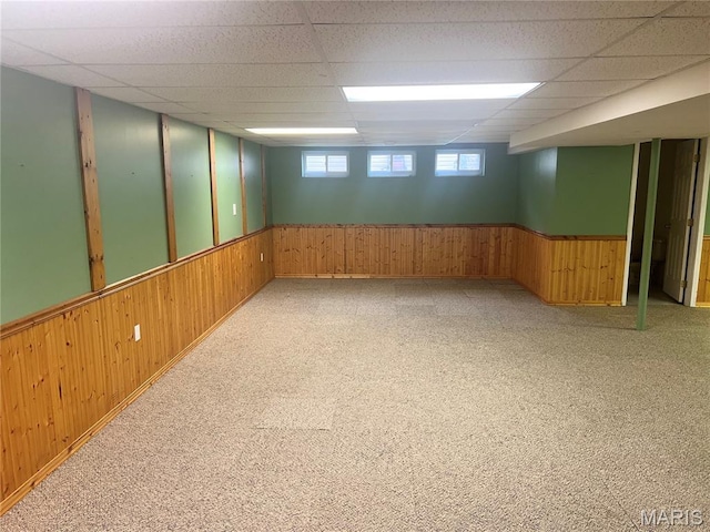 1 Calumet Meadows Ct, Ofallon, MO 63376 - unfurnished room featuring wooden walls, a paneled ceiling, wainscoting, and light colored carpet