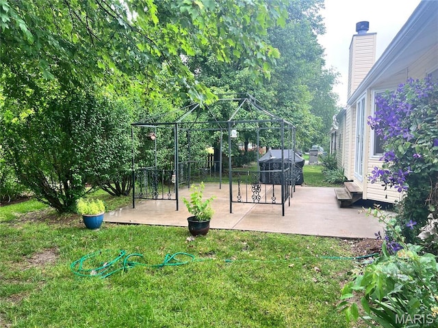 1 Calumet Meadows Ct, Ofallon, MO 63376 - view of grassy yard featuring a gazebo and a patio area