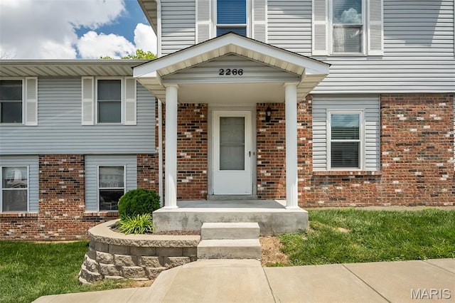 2266 Highland Hill Dr Unit F, Saint Peters, MO 63376 - property entrance featuring brick siding
