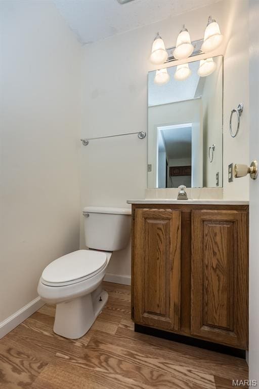 2266 Highland Hill Dr Unit F, Saint Peters, MO 63376 - bathroom featuring vanity and wood finished floors