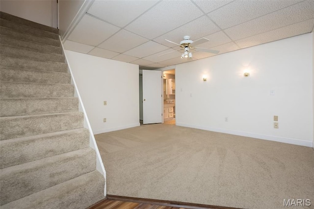 2266 Highland Hill Dr Unit F, Saint Peters, MO 63376 - spare room featuring stairway, ceiling fan, a paneled ceiling, and carpet
