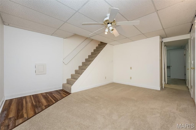 2266 Highland Hill Dr Unit F, Saint Peters, MO 63376 - below grade area with carpet floors, stairway, a drop ceiling, a ceiling fan, and wood finished floors