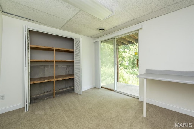 2266 Highland Hill Dr Unit F, Saint Peters, MO 63376 - unfurnished bedroom featuring a paneled ceiling, carpet, access to outside, and a closet