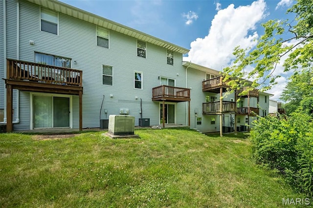 2266 Highland Hill Dr Unit F, Saint Peters, MO 63376 - back of house with a yard and a wooden deck