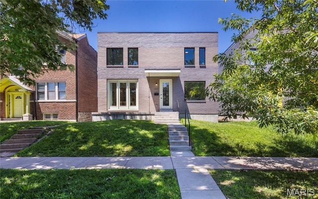 4133 Lafayette Ave, Saint Louis, MO 63110 - contemporary house with brick siding and a front lawn