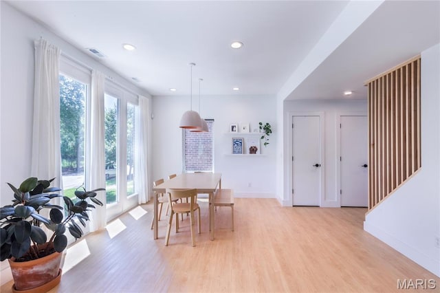 4133 Lafayette Ave, Saint Louis, MO 63110 - dining area featuring plenty of natural light, light wood-style flooring, and recessed lighting
