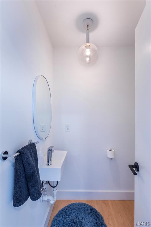 4133 Lafayette Ave, Saint Louis, MO 63110 - bathroom with a sink and wood finished floors