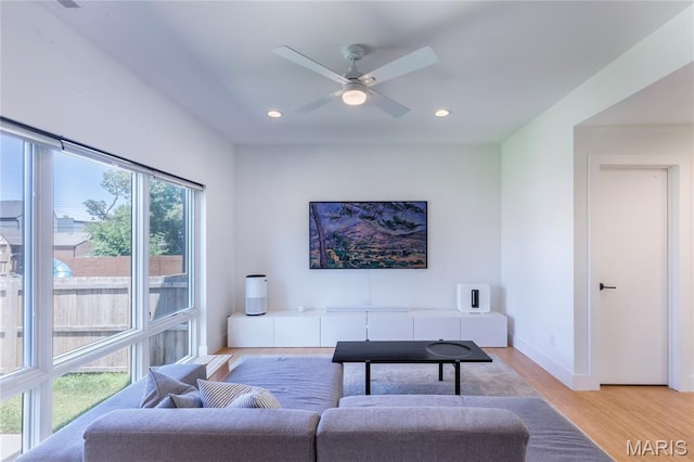 4133 Lafayette Ave, Saint Louis, MO 63110 - living area featuring light wood finished floors, recessed lighting, and ceiling fan