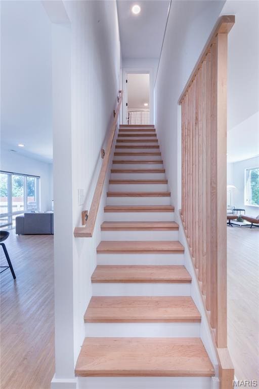 4133 Lafayette Ave, Saint Louis, MO 63110 - stairs featuring wood finished floors and recessed lighting