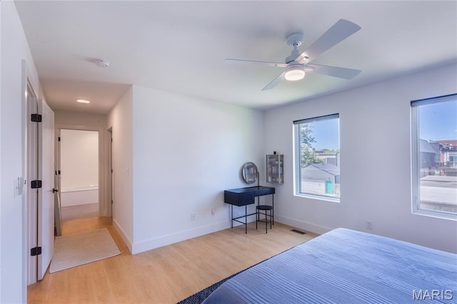 4133 Lafayette Ave, Saint Louis, MO 63110 - bedroom featuring wood finished floors and ceiling fan