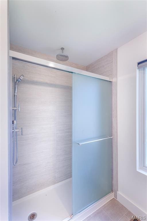 4133 Lafayette Ave, Saint Louis, MO 63110 - bathroom with a shower stall and tile patterned floors