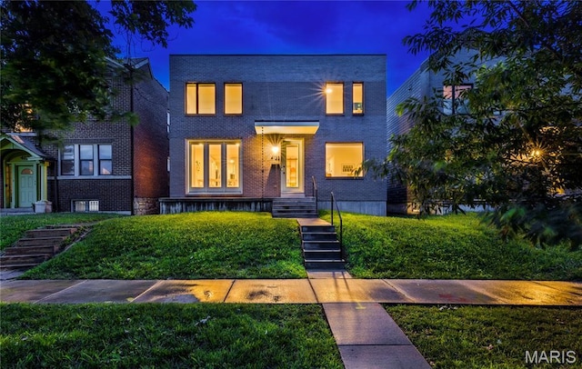 4133 Lafayette Ave, Saint Louis, MO 63110 - modern home with brick siding and a lawn