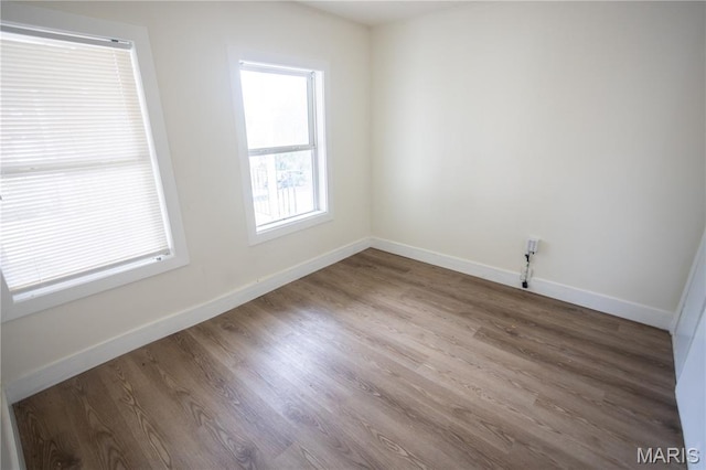 7353 Virginia Ave, Saint Louis, MO 63111 - empty room featuring wood finished floors and baseboards