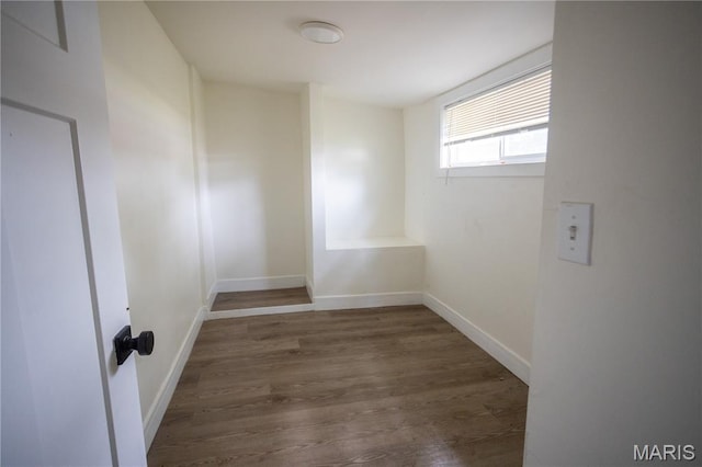 7353 Virginia Ave, Saint Louis, MO 63111 - unfurnished room featuring wood finished floors and baseboards