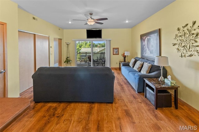 319 Timber Ridge Dr, Grafton, IL 62037 - living room featuring wood finished floors, a ceiling fan, and recessed lighting