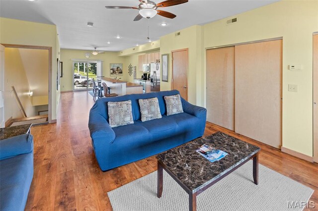 319 Timber Ridge Dr, Grafton, IL 62037 - living area featuring ceiling fan, wood finished floors, and recessed lighting