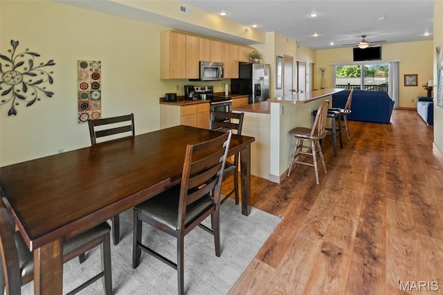 319 Timber Ridge Dr, Grafton, IL 62037 - dining room featuring wood finished floors, recessed lighting, and a ceiling fan