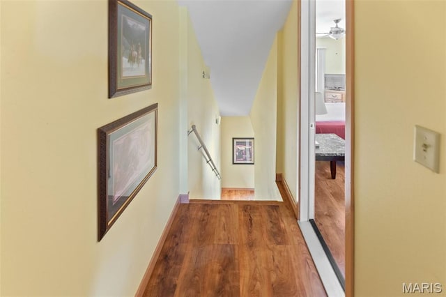 319 Timber Ridge Dr, Grafton, IL 62037 - corridor featuring an upstairs landing and wood finished floors