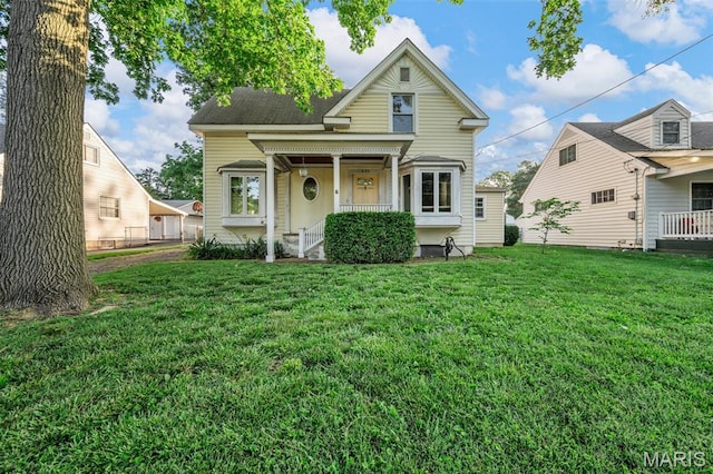 135 Oak Tree Dr, Webster Groves, MO 63119 - view of front of house featuring a front lawn and a porch