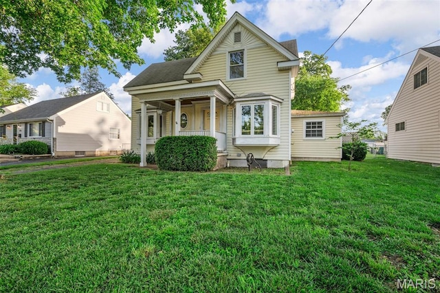 135 Oak Tree Dr, Webster Groves, MO 63119 - view of front of home with a front lawn and a porch
