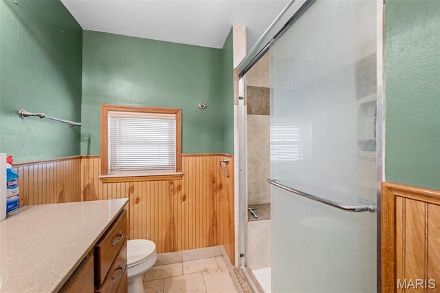 135 Oak Tree Dr, Webster Groves, MO 63119 - full bathroom with wainscoting, a shower stall, vanity, and wooden walls