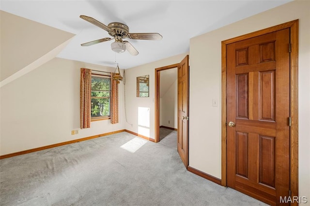 135 Oak Tree Dr, Webster Groves, MO 63119 - unfurnished bedroom with light colored carpet and ceiling fan